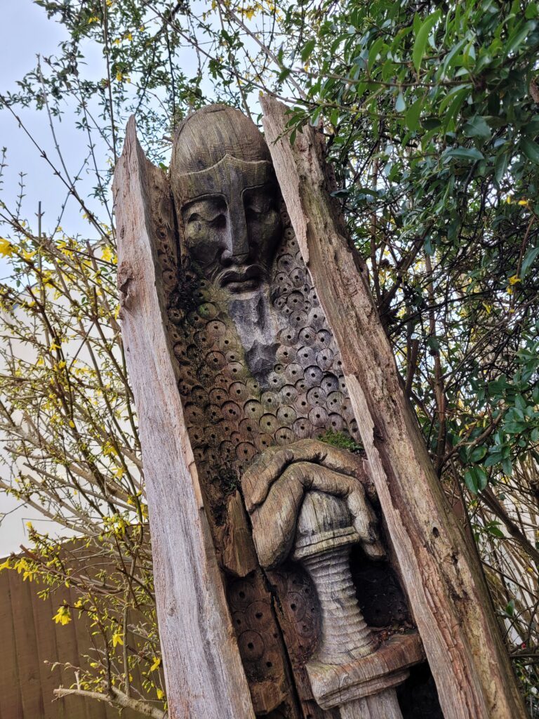 Decorative wooden statue at The Village Bakery and Cafe, Caerleon