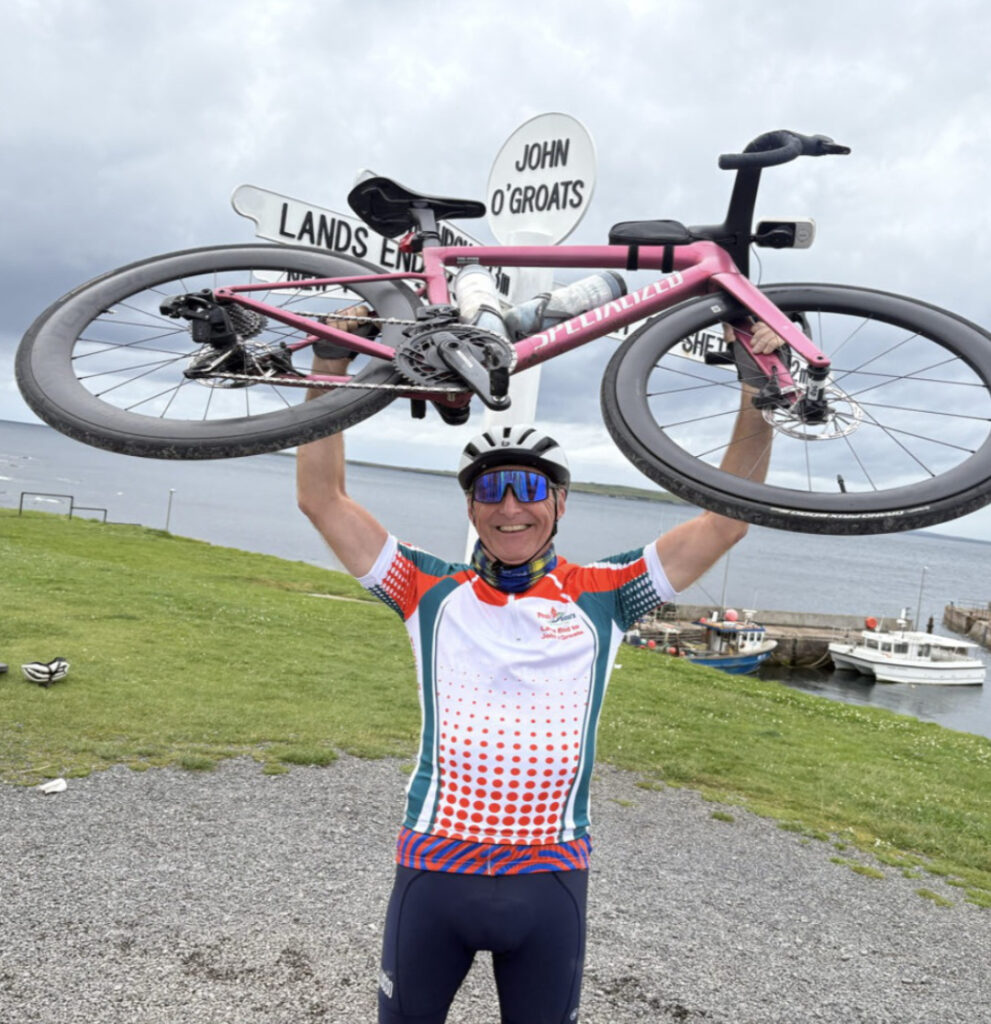 Dave celebrating at John O'Groats